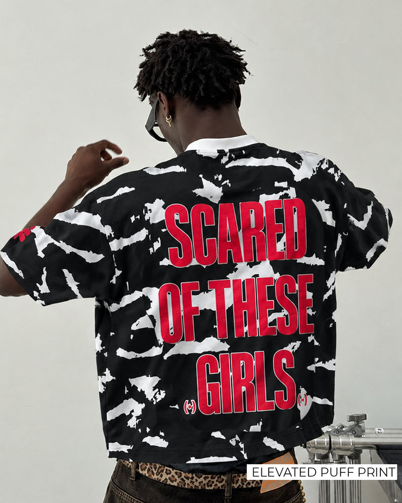 She Knows Boxy-Fit T-shirt
